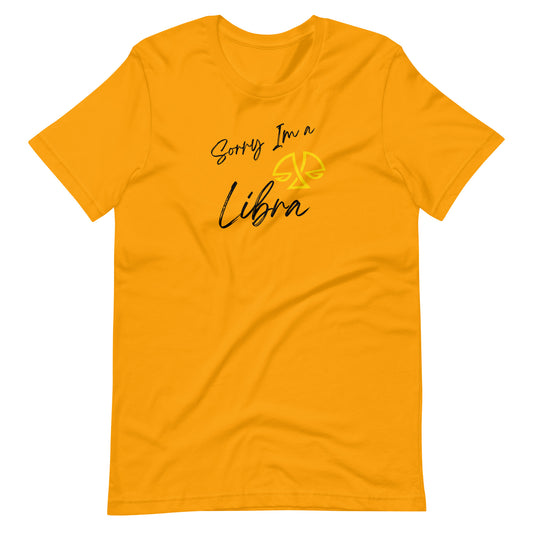 "Mustard t-shirt with 'Sorry I'm a Libra' text and Libra zodiac symbol in pastel yellow and black design."