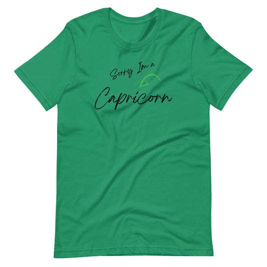 "Green t-shirt with 'Sorry I'm a Capricorn' text and Capricorn zodiac symbol in charcoal gray and black design."

