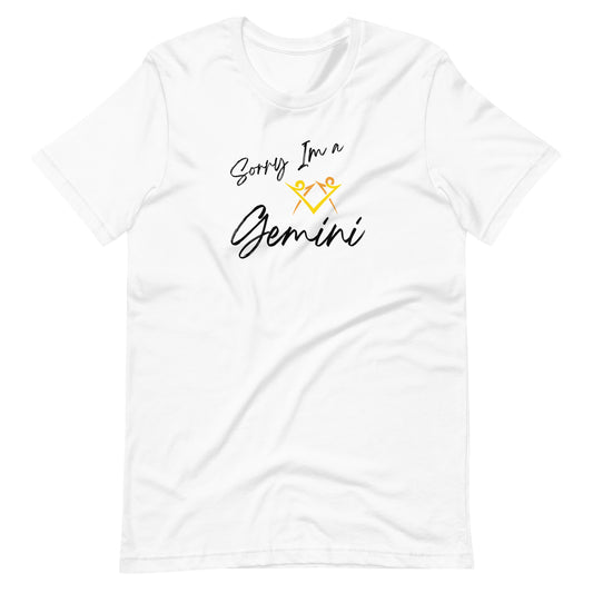 White t-shirt with 'Sorry I'm a Gemini' text and Gemini zodiac symbol in vibrant yellow and black design.