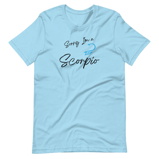 "Light blue t-shirt with 'Sorry I'm a Scorpio' text and Scorpio zodiac symbol in deep red and black design."