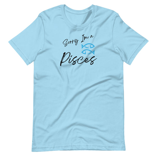 "Light blue t-shirt with 'Sorry I'm a Pisces' text and Pisces zodiac symbol in sea green and black design."